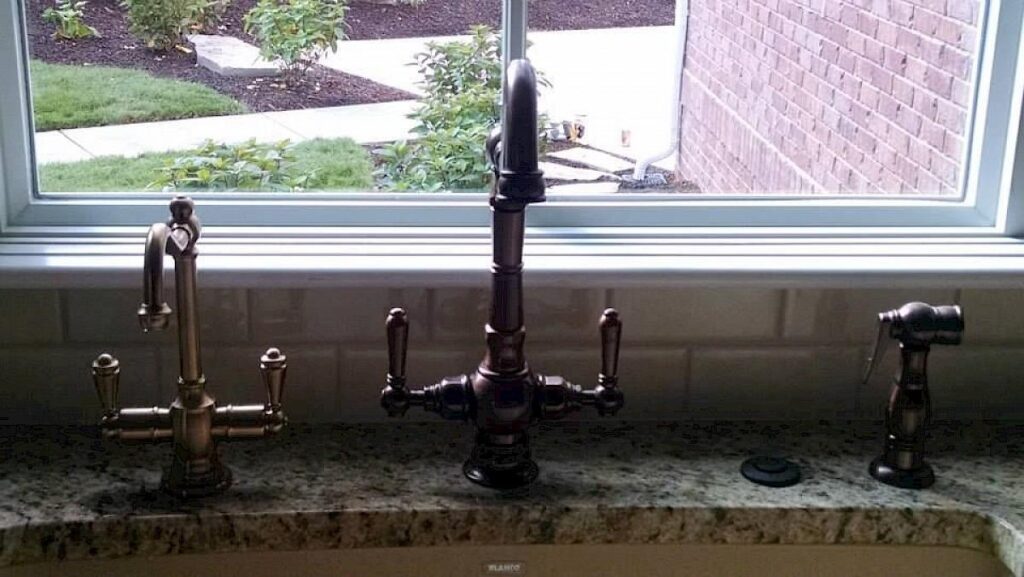 Custom faucet installed in kitchen sink